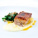 Pork Belly confit with tangerine-sesame emulsion, grits & chinese chives