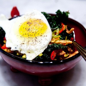 Crispy pigs ears with crispy kale, pickled cherry peppers and fried egg