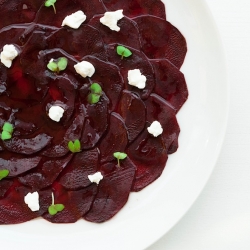 Balsamic beet carpaccio with goat cheese and hazelnut vinaigrette 